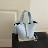 Bolso tipo cubo de temperamento estilo extranjero 2026 versión coreana verano nuevo elegante simple casual versátil bandolera cruzada bolso de mano