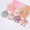 Chaveiro de Elefante com Padrão de Gotejamento de Óleo Criativo de Luxo Leve Pequeno Pingente Animal Flor de Metal Pequeno Elefante Chaveiro