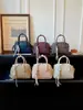 Bolso Boston de alta gama nuevo 2026 para mujer, un bolso de hombro versátil y elegante para el día a día, un bolso de mano retro con diseño de concha