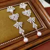 Brincos de Pérola com Borla de Laço Incrustada com Diamante e Agulha de Prata Retrô Francês Exquisitos Versáteis Luxo Acessível Brincos de Alta Qualidade
