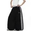 Comercio exterior transfronterizo calle alta americana retro a rayas retazos gris pantalones de chándal de pierna recta unisex deportivos holgados pantalones de pierna ancha