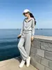 Nuevo traje deportivo casual de estilo coreano en color gris para mujer para otoño, moderno y juvenil, conjunto de dos piezas con chaqueta elegante y pantalones de pierna ancha