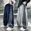 Roupas Infantis Calça Esportiva Listrada com Fita para Meninos Primavera 2026 Nova Calça Casual de Perna Reta Infantil para Crianças Maiores Calça Solta Transfronteiriça