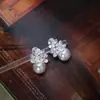 Flores de Brocado Design Único de Nicho Fresco e Elegante Flor de Zircônia 3D Suporte para Espiral de Mosquito Clipe de Orelha Brinco