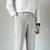 Pantalones largos de hombre estilo coreano finos holgados pantalones de traje pequeños estilo Hong Kong casual pantalones de traje versátiles de pierna recta con caída pantalones largos