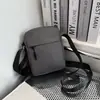 Bolso de hombro nuevo con un toque de alta gama, bolso casual de negocios para teléfono, bolso pequeño cruzado, mochila deportiva de moda, bolso cruzado para hombre transfronterizo
