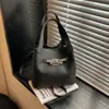 Bolsa Feminina Grande de Mão Estilo Vintage 2026 Nova Outono e Inverno Cor Sólida Casual Bolsa Pequena Transversal Tipo Saco