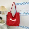 Bolsa de Lona Estampada com Letras Nova de Verão Design de Nicho Feminino Bolsa de Ombro de Grande Capacidade Bolsa Tote com Atmosfera Preguiçosa