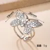 Nuevo anillo de acero inoxidable transfronterizo, moderno y único anillo de mariposa prensado en aceite para mujer, anillo de diseño geométrico que no se decolora