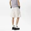 Shorts casuais azuis-marinho com corte enviesado estilo americano para homens, calças de seda gelada de secagem rápida para o verão com um toque jovem e corte solto