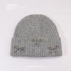 Gorro coreano con lazo de perla para mujer, gorro de punto grande y suelto para otoño e invierno, gorro japonés cálido de lana con protección para las orejas