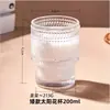 Colección de vidrio nicho medio-antiguo apilable con relieve de girasol Vidrio patrón Glaciar Taza burbuja jugo taza de café