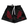 Pantalones cortos deportivos holgados de verano hasta la rodilla para hombre, estilo americano, transpirables, de secado rápido, para baloncesto, entrenamiento de moda, de tres o cuatro puntos.