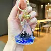 Chaveiro Vela Azul Série Oceano Infundido com Óleo Pingente Criativo de Areia Líquida Acrílica Acessório para Alça de Bolsa Presente
