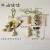 Kit de material DIY para fazer um móbile de casca de fruta, um sino pendurado de cura, com frutas pretas indonésias, estramônio, lírio d'água e rotim