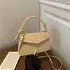 Bolsa pequena estilosa e versátil para mulheres, nova coleção 2026, perfeita para o trabalho e o uso diário, bolsa de ombro chique, bolsa quadrada pequena transversal da moda