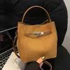 Bolsa Balde Retrô Portátil Transfronteiriça para Mulheres Outono e Inverno 2026 Nova Grande Capacidade Casual Versátil Ombro Transversal