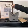Bolso de Mano Tejido Transfronterizo Bolso Cubo para Mujer 2026 Nuevo Verano Bolso de Playa para el Trabajo Bolso de Hombro Cruzado Versátil