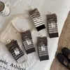 Nuevos Calcetines de Lana Gruesos y Cálidos para Hombre y Mujer Serie de Algodón de Doble Aguja Vertical Estilo Académico Estudiante Cachemir de Tubo Largo