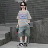 Conjunto de Verano de Manga Corta para Niños 2026 Nuevo Elegante Fresco Moderno Ropa de Verano Delgada Rayada para Niños