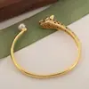 Distrito Lu Moda Transfronteriza Nuevo Pulsera de Cabeza de Leopardo Chapada en Cobre y Oro Zirconio Creativo Animal Hueco Pulsera Venta al por Mayor