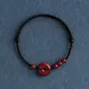 Un Brazalete de Cuerda Roja con Hebilla de Seguridad de Cinabrio de por Vida para Hombres y Mujeres en su Año Zodiacal, Brazalete Trenzado con Cuentas de Buena Suerte para Protegerse y Asegurar la Seguridad
