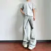 Jeans retro americanos elásticos plisados micro-bota, estilo ro de calle, pantalones rectos holgados de nicho de longitud de piso para hombres y mujeres