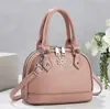 Nuevo bolso cruzado vintage con relieve de concha para mujer, bolso de mano moderno y versátil, bolso de hombro, bolso cruzado, bolso de nicho de moda