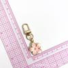 Pingente de bolsa de liga transfronteiriça com gota de óleo, chaveiro, flor de cerejeira fofa, ameixa, flor criativa, pingente para celular