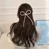 Pinza para el pelo de lazo de perla dulce y elegante, pinza superior de temperamento femenino, pinza de resorte para la parte posterior de la cabeza, accesorios para el cabello con sentido avanzado