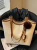 Yuezhi 2026 principios de otoño nueva moda bolso retro con estampado de leopardo, bolso de hombro para el trabajo, bolsa tote tipo cubo popular de venta caliente