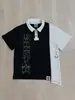 Camiseta de Verano de Manga Corta Estilo Ins Transfronterizo con Calavera de Pedrería Oscura, Diseño de Hebilla Metálica Lateral y Cuello Solapa, Top de Corte Holgado