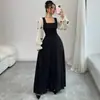 Vestido largo de estilo francés con bloques de color y lazo, de estilo hada, transfronterizo europeo y americano 2026, con corpiño negro puro y diseño de cintura alta
