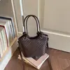 2026 Verano Chic Texturizada Estilo Coreano Personalidad para el Trabajo Moda Bolso Cesta Tejida Bolso Cruzado de Moda Casual Bolso Cubo