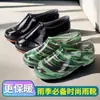 Zapatos impermeables 2026 botas de lluvia zapatos de cocina impermeables de caña corta con suela gruesa forrados de felpa botas de lluvia resistentes al desgaste antideslizantes engrosados cálidos zapatos para estudiantes