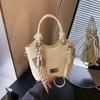 Bolso de mano retro con textura popular de este año, bolso de hombro colgante para mujer, tendencia de primavera 2025, sencillo y combinable.