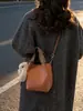 Bolsa Saco com Padrão Lichia para Mulheres 2026 Inverno Nova Casual Versátil Bolsa de Mão Bolsa de Ombro Fashionável para o Dia a Dia Bolsa Transversal