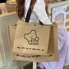 Bolsa Não Tecida Sacola de Loja de Roupas Bolsa para Roupas Femininas Fita de Embalagem Sacola de Compras Atacado Cinto de Presente