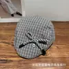 Gorra Plana con Lazo Lindo Estilo Coreano para Mujer Primavera/Verano 2026 Moda Casual Dulce que Reduce la Edad Boina Venta al por Mayor