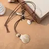 Colar Estilo Boho com Concha do Mar, Estrela do Mar e Búzios, Peça Longa com Mistura de Estilos, Acessório da Moda e Versátil