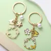 Pingente Chaveiro Borboleta Amarela Flor do Amor Cruzada Pérola Oca Estilo Doce Pingente Simples Pingente de Bolsa
