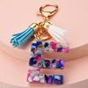 Llavero con 26 letras en inglés, estilo europeo y americano, con borlas de cristal acrílico transparente, adorno para bolso, pequeño regalo.
