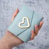 Nueva cartera corta de moda transfronteriza para mujer, monedero pequeño con forma de corazón versión coreana, cartera plegable para dama 70% de descuento, monedero para estudiantes