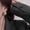Aretes retro Maillard semicírculo resina temperamento femenino nicho diseño sentido aretes otoño e invierno moda estilo frío aretes