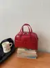 Bolsa de Mão de Luxo para Mulheres, Nova Moda Primavera 2026, Nicho de Luxo Leve Bolsa Almofada Vermelha de Ombro Transversal