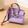 Mini bolso platino, charm para bolso de mujer, accesorio de llavero de coche lindo y creativo, bolsa para auriculares, bolsa para lápiz labial, bolso tipo cubo