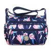 Atacado de fábrica grande capacidade Bolsa de tecido colorido de nylon feminina tipo bolinho bolsa grande de tecido bolsa de ombro feminina bolsa de compras
