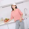 Una generación de nuevas mujeres de algodón color liso con copa integrada cuello redondo suelto manga corta jersey casual para casa camisa base