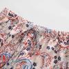 Aliexpress Venta al por mayor de ropa europea y americana transfronteriza para mujer Primavera temprana 2025 Nuevo Pantalones casuales de satén con graffiti de anacardo de temperamento