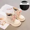 Botas Martin de couro da moda para crianças 2026 outono e inverno novo botas Martin de cano médio com laço atacado